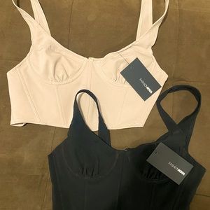 Two neutral bustier tops